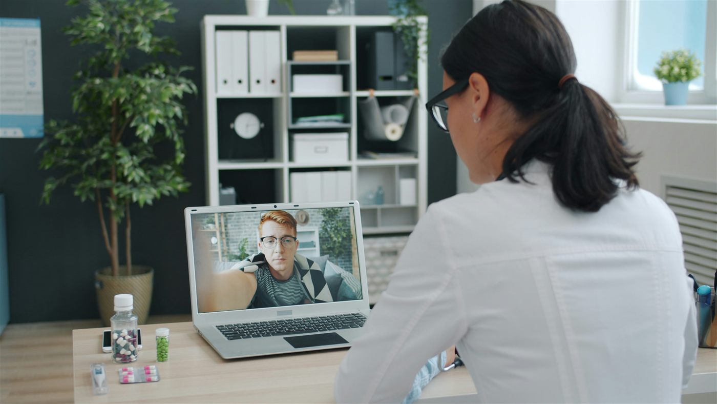 Doctor providing a telehealth consultation via video call